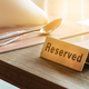 Illustration for article titled Ex-OpenTable employee charged with felony for booking hundreds of false reservations